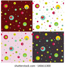 Set of four seamless patterns with colorful circles. Vector illustration. Can be tiled seamlessly in any directions. 