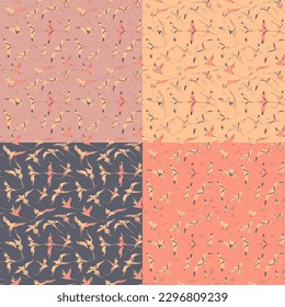 Set of four seamless patterns with flying white-tailed tropicbirds. Vector illustration.