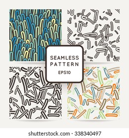 Set of four seamless vector patterns of amoebae and other protozoa bacilli. Patterns with seaweeds, anemones or worms.