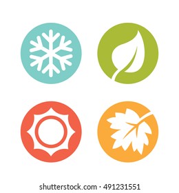A set of four seasons icons. Winter, spring, summer and autumn.