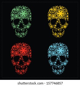 Set of four skulls with flowers. vector