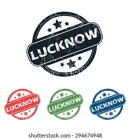 Set of four stamps with name Lucknow and stars, isolated on white