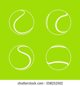  Set of four tennis balls logos on green background.