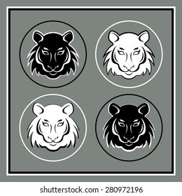 Set of four tiger heads emblems. Vector illustration