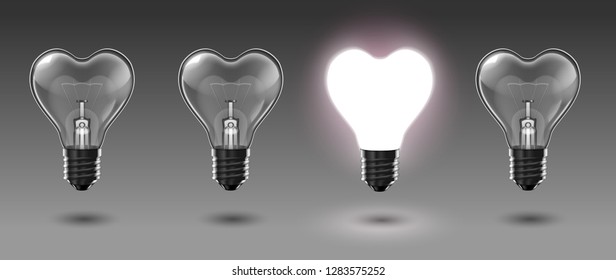 A set of four transparent heart-shaped bulbs, one of which glows with white light. Highly realistic illustration.