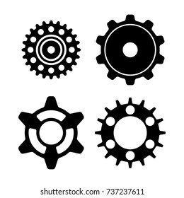 A set of four unique vector gear icons.