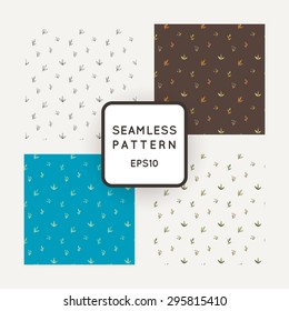 Set of four vector abstract seamless patterns of twigs painted by hand