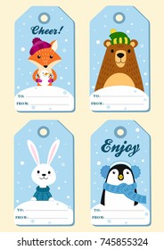 Set of four vector festive Christmas tags. Vector illustrations.