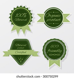 Set of four vector flat green badges for eco-friendly design