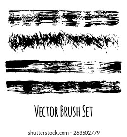 Set of four vector grunge contrasting brushes on a white background