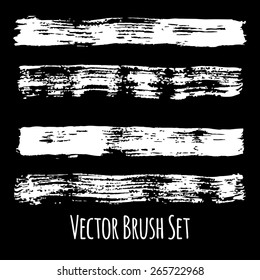 Set of four vector grunge contrasting brushes