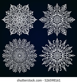 Set of four vintage snowflake vectors