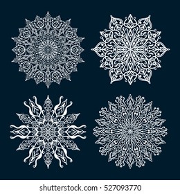 Set of four vintage snowflake vectors