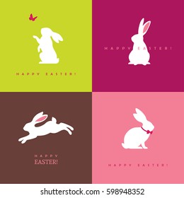 Set of four white bunny silhouettes for Easter greeting card, banner or poster design. Rabbit icon.