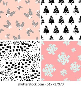 A set of four winter seamless repeat patterns with Christmas trees, holly and snowflakes. Tiling festive background, greeting card or wrapping paper.