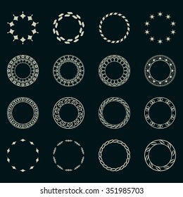 Set fractal and swirl shape element. Vintage monochrome round objects. Vector decorative sample. Diaphragm, border, outline yellow color in green blue background. Round black shapes with text
