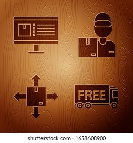 Set Free delivery service , Computer monitor with app delivery tracking , Cardboard box with traffic symbol and Delivery man with cardboard boxes  on wooden background. Vector