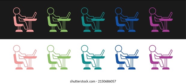 Set Freelancer icon isolated on black and white background. Freelancer man working on laptop at his house. Online working, distant job concept.  Vector