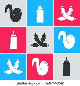 Set Fried chicken wing, Sauce bottle and Crossed sausage icon. Vector