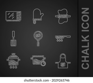 Set Fried eggs on frying pan, Cooking pot, Kitchen apron, Frying, Barbecue spatula, Rolling pin dough and Microwave oven icon. Vector