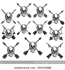 Set of front view skulls with lower jaw with different crossed arrows. Vector heraldic design elements isolated on white