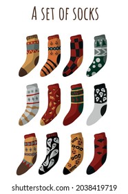 A set of fun, bright, woolen, stylish socks with a pattern and patterns. Christmas socks, for Halloween, for the new year, knitted. Cozy atmosphere. A gift for the holiday. An item of clothing.