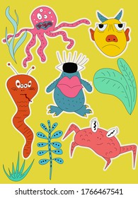 A set of funny little monster characters that you can use to print stickers. Vector illustration of funny monsters.