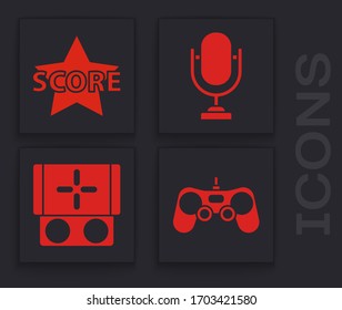 Set Gamepad, Star, Microphone and Portable video game console icon. Vector