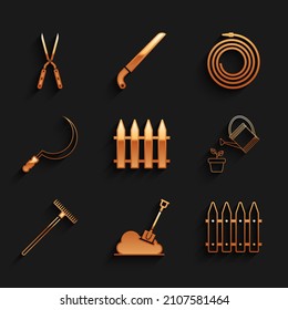 Set Garden fence, Shovel in the ground, Watering can, rake, Sickle, hose or fire hose and Gardening handmade scissor icon. Vector