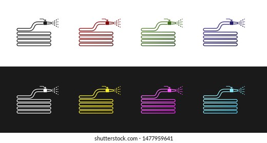 Set Garden hose or fire hose icon isolated on black and white background. Spray gun icon. Watering equipment.  Vector Illustration