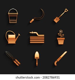 Set Garden hose or fire hose, trowel spade shovel, saw, Flower in pot, Gardening handmade scissor, Watering can,  and Bucket icon. Vector