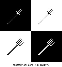 Set Garden pitchfork icon isolated on black and white background. Garden fork sign. Tool for horticulture, agriculture, farming.  Vector Illustration