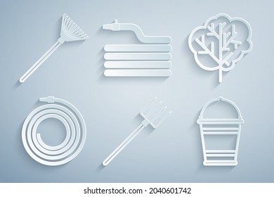 Set Garden pitchfork, Tree, hose fire hose, Bucket,  and rake leaves icon. Vector