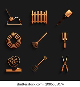 Set Garden rake for leaves, pitchfork, Gardening handmade scissor, Planting tree the ground, hose fire hose, shovel and Shovel icon. Vector