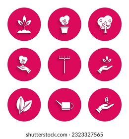 Set Garden rake, Watering can, Sprout hand of environmental protection, Plant, Leafs, Tree, with apple and  icon. Vector