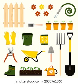 A set of gardening items: wheelbarrow, pruner, bucket, gloves, watering can, etc. The concept of environmentally friendly products and breeding of new plant varieties.