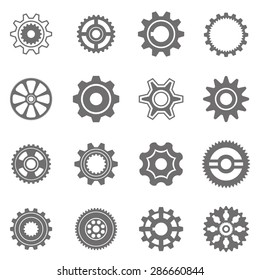 Set of gear wheels in black and white. By changing size, gears can be combined into mechanism.