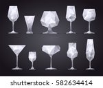 Set of geometric icon wine, champagne, cocktail, vodka, tequila, martini glass on black background. Poly and triangle style. JPG include isolated path. eps10