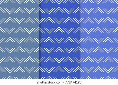 Set of geometric ornaments. Blue vertical seamless patterns for web, textile and wallpapers