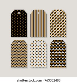 Set of geometric texture Christmas and New Year ready-to-use gift tags or labels. Black, white and  ocher/gold colors.