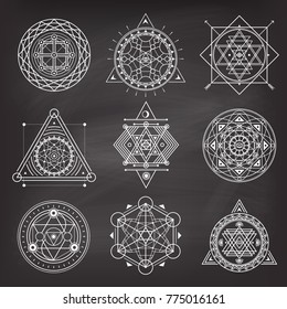 Set of geometry sacred symbols on blackboard background . Vector 