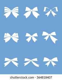 Set of gift bows with ribbons on blue background vector illustration 