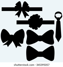 Set gift bows with ribbons and tie. Isolated on blue background. Vector silhouettes