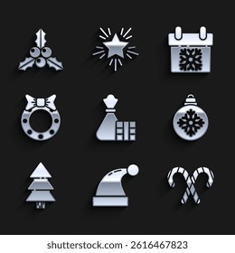Set Gift box and bag, Christmas Santa Claus hat, candy cane with stripes, ball, tree, wreath, Calendar and Branch viburnum or guelder rose icon. Vector