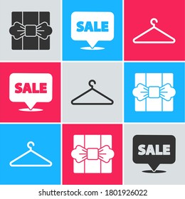 Fijar la caja de regalo, el signo de colgando con el icono de armario de venta y colgador. Vector