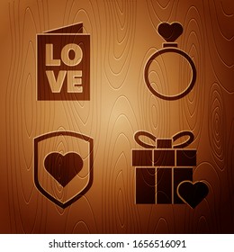 Set Gift box and heart, Valentines day party flyer, Heart with shield and Wedding rings on wooden background. Vector