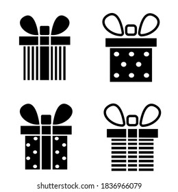 A set of gift boxes with a bow isolated on a white background. Design for Christmas, holidays, birthday, new year. Vector 