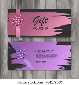 Set of gift cards, with dark background, decorated with a realistic bow and brush stroke. Vector eps 10