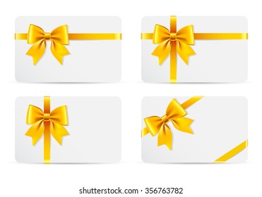 Set of gift cards with golden bow and ribbons