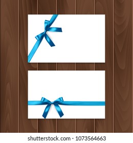 Set of gift cards with realistic bow and ribbon. Gift card template for your text or design